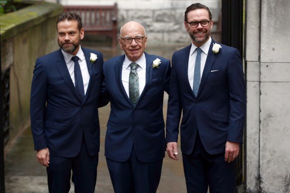 Rupert Murdoch with his sons Lachlan (L) and James as they arrive at St Bride’s church for a service to celebrate the wedding between Rupert Murdoch and former supermodel Jerry Hall.